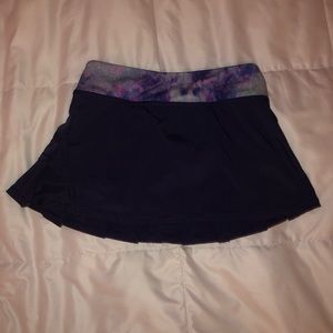 A navy/dark purple skirt from Ivivva